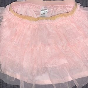 Carter’s pink tulle skirt with gold waistband
